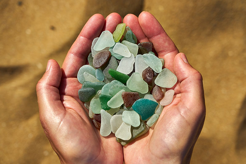 Sea glass on hands