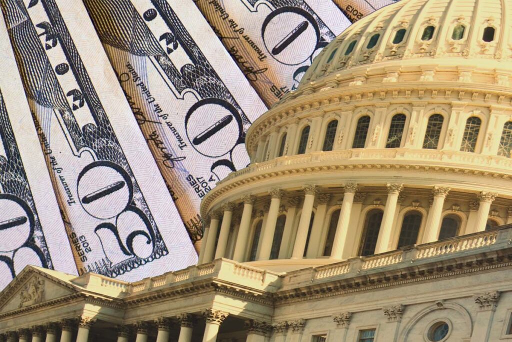 US Capitol Building with US Dollars in the background