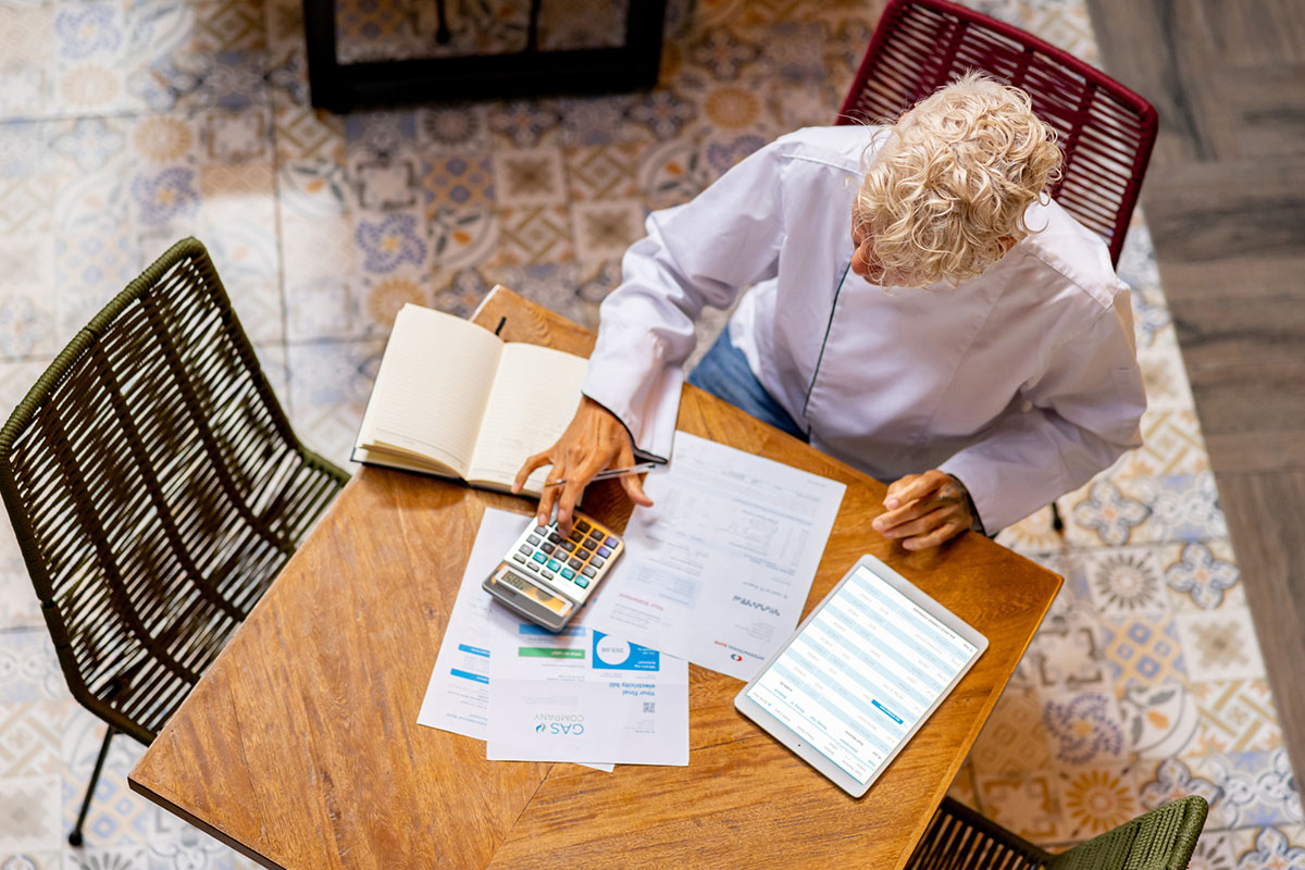 Business manager doing the books at a restaurant