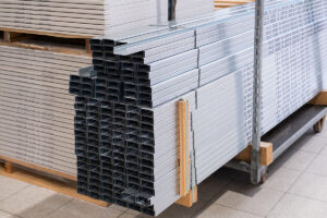 Stack of Building Material Aluminum Profile For Drywall At The Construction Work Site