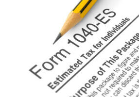 Close-up form 140-ES (Estimated Tax for Individuals) with pencil on it