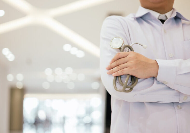 Torso shot of doctor with a stethoscope in hand