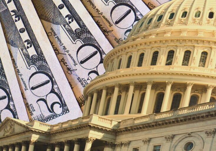 US Capitol Building with US Dollars in the background